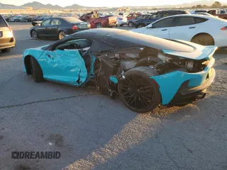 2023 McLaren GT z VIN SBM22GCA0PW002765, wystawiony jako Copart lot #78866364 z przebiegiem Nie podano mil oraz Szkody całkowita. Historia ofert i sprzedaży dostępna na DreamBid. Obrazek 2.
