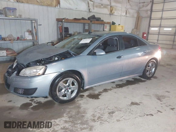2009 Pontiac G6 1SB with VIN 1G2ZJ57B894237824, listed as a IAAI auction lot 41731113 with 144,914 mi miles and . Bid and sale history available at DreamBid. Image 2.