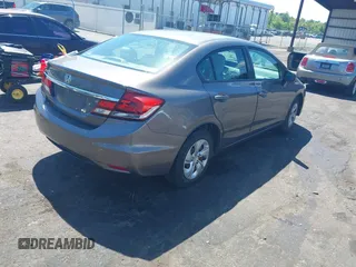 2015 Honda Civic Sedan LX with VIN 19XFB2F58FE082269, listed as a IAAI auction lot 42031294 with 105,260 mi miles. Bid and sale history available at carsss.com. Image 4.