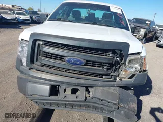 2014 Ford F-150 XL with VIN 1FTMF1CM4EKE98669, listed as a IAAI auction lot 41310314 with 133,239 mi miles. Bid and sale history available at carsss.com. Image 12.