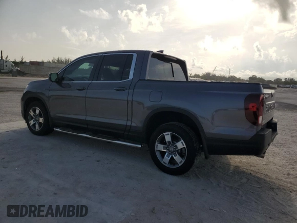 2024 Honda Ridgeline RTL with VIN 5FPYK3F57RB028966, listed as a Copart auction lot 60211885 with 10,963 mi miles and Salvage title. Bid and sale history available at DreamBid. Image 2.