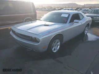 2012 Dodge Challenger SXT with VIN 2C3CDYAG0CH133549, listed as a IAAI auction lot 41368901 with 118,154 mi miles. Bid and sale history available at carsss.com. Image 2.