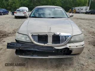 2005 Lincoln Town Car Signature z VIN 1LNHM81W35Y626266, wystawiony jako Copart lot #57461675 z przebiegiem 315 827 mil mil oraz Czysty tytuł • Clean title. Historia ofert i sprzedaży dostępna na DreamBid. Obrazek 5.