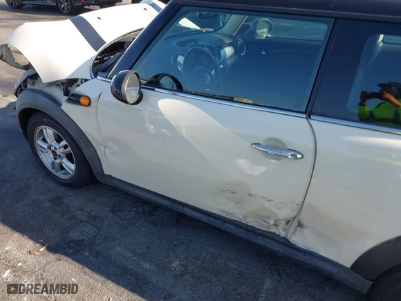 2012 MINI Cooper Hardtop with VIN WMWSU3C53CT258034, listed as a IAAI auction lot 40379259 with 96,370 mi miles. Bid and sale history available at carsss.com. Image 14.