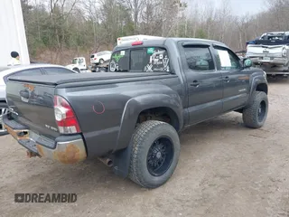 2009 Toyota Tacoma with VIN 3TMLU42N99M036667, listed as a IAAI auction lot 41856732 with 168,748 mi miles and . Bid and sale history available at DreamBid. Image 4.