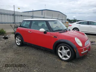2002 MINI Hardtop with VIN WMWRC33422TE12260, listed as a Copart auction lot 66409484 with 112,119 mi miles and Salvage Title. Bid and sale history available at DreamBid. Image 4.