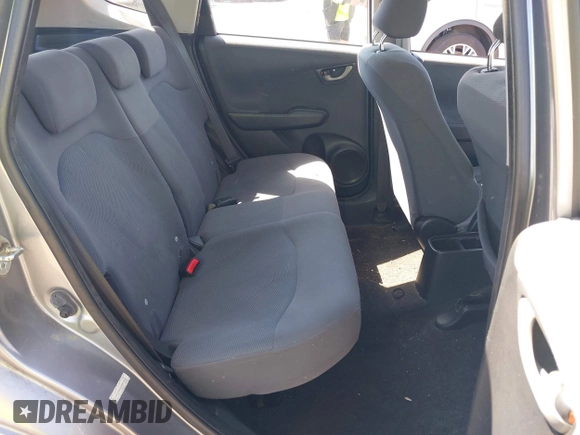 2009 Honda Fit with VIN JHMGE882X9S000639, listed as a IAAI auction lot 42308524 with 211,128 mi miles and . Bid and sale history available at DreamBid. Image 8.