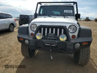 2009 Jeep Wrangler X with VIN 1J4FA24199L787574, listed as a Copart auction lot 58189835 with 74,331 mi miles and Salvage title. Bid and sale history available at DreamBid. Image 5.