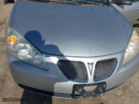 2005 Pontiac G6 GT with VIN 1G2ZH528454152965, listed as a IAAI auction lot 41849100 with 220,177 mi miles. Bid and sale history available at carsss.com. Image 6.