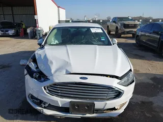 2018 Ford Fusion Hybrid SE with VIN 3FA6P0LU7JR188124, listed as a IAAI auction lot 41760184 with 74,731 mi miles. Bid and sale history available at carsss.com. Image 12.