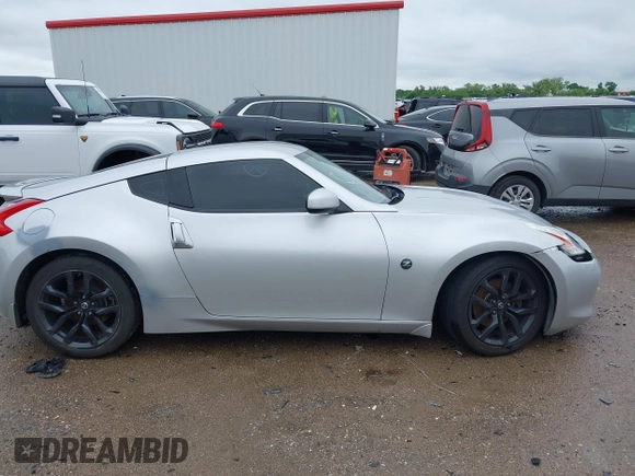 2010 Nissan 370Z Touring with VIN JN1AZ4EH9AM503264, listed as a IAAI auction lot 42180901 with Not provided miles and . Bid and sale history available at DreamBid. Image 13.
