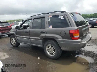2000 Jeep Grand Cherokee Laredo с VIN 1J4G248S4YC299003, выставлен на аукционе Copart как лот 55937685 с пробегом Не указан миль и Списание • Salvage title. История ставок и продаж доступна на DreamBid. Изображение 2.