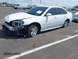2014 Chevrolet Impala LT with VIN 2G1WB5E34E1101292, listed as a IAAI auction lot 42487680 with 273,654 mi miles and . Bid and sale history available at DreamBid. Image 2.