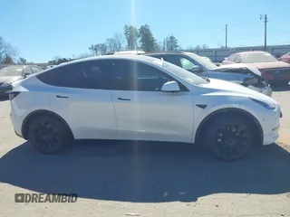 2021 Tesla Model Y Long Range with VIN 5YJYGDEE8MF125104, listed as a IAAI auction lot 41698065 with 25,177 mi miles and . Bid and sale history available at DreamBid. Image 12.