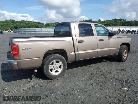 2010 Dodge Dakota Bighorn/Lonestar z VIN 1D7RW3GK7AS223579, wystawiony jako Copart lot #61880374 z przebiegiem 102 134 mil mil oraz Czysty tytuł • Clean title. Historia ofert i sprzedaży dostępna na DreamBid. Obrazek 3.