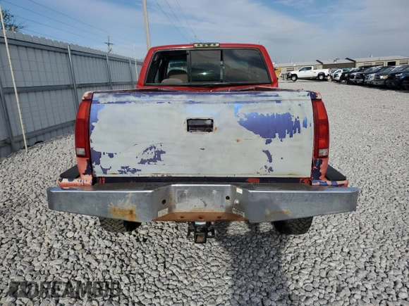 1999 GMC Sierra 2500 z VIN 1GTGK29R3XF020000, wystawiony jako Copart lot #53698755 z przebiegiem 241 366 mil mil oraz Szkody całkowita. Historia ofert i sprzedaży dostępna na DreamBid. Obrazek 6.