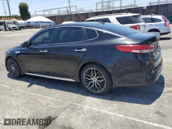 2018 Kia Optima Premium z VIN KNAGT4LE8J5023841, wystawiony jako Copart lot #61431235 z przebiegiem 193 841 mil mil oraz Czysty tytuł • Clean title. Historia ofert i sprzedaży dostępna na DreamBid. Obrazek 2.
