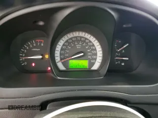 2007 Kia Spectra with VIN KNAFE161375009514, listed as a Copart auction lot 51656405 with 137,418 mi miles and Salvage Title. Bid and sale history available at carsss.com. Image 9.