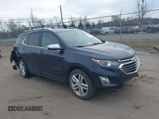 2018 Chevrolet Equinox Premier with VIN 3GNAXWEX5JS575639, listed as a IAAI auction lot 41913209 with 131,123 mi miles and . Bid and sale history available at carsss.com. Image 1.