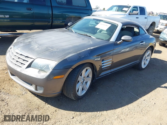2004 Chrysler Crossfire z VIN 1C3AN69L14X007112, wystawiony jako IAAI lot #40656585 z przebiegiem 99 674 mil mil oraz . Historia ofert i sprzedaży dostępna na DreamBid. Obrazek 2.