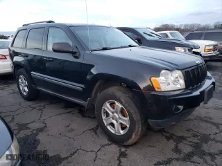 2007 Jeep Grand Cherokee Laredo with VIN 1J8GR48K17C543067, listed as a Copart auction lot 84442224 with 125,446 mi miles and Salvage Title. Bid and sale history available at carsss.com. Image 4.