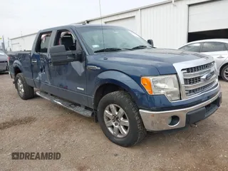 2014 Ford F-150 XL with VIN 1FTFW1ETXEFA50751, listed as a IAAI auction lot 42055118 with 196,808 mi miles and . Bid and sale history available at DreamBid. Image 1.