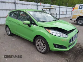 2014 Ford Fiesta Titanium z VIN 3FADP4FJ8EM165941, wystawiony jako IAAI lot #42221629 z przebiegiem 105 582 mil mil oraz . Historia ofert i sprzedaży dostępna na DreamBid. Obrazek 1.