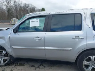 2013 Honda Pilot EX-L with VIN 5FNYF4H65DB080307, listed as a IAAI auction lot 41987016 with Not provided miles and . Bid and sale history available at DreamBid. Image 14.