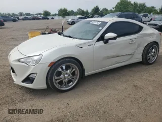 2016 Scion FR-S z VIN JF1ZNAA15G9702932, wystawiony jako Copart lot #60267255 z przebiegiem 180 123 mil mil oraz Czysty tytuł • Clean title. Historia ofert i sprzedaży dostępna na DreamBid. Obrazek 1.