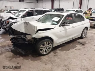 2014 BMW 3 Series 328i xDrive with VIN WBA3B3G52ENR81756, listed as a IAAI auction lot 41714588 with 122,678 mi miles. Bid and sale history available at carsss.com. Image 2.