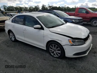 2012 Volkswagen Jetta SE with VIN 3VWDP7AJ4CM335256, listed as a Copart auction lot 57080145 with 228,239 mi miles and Salvage title. Bid and sale history available at DreamBid. Image 4.