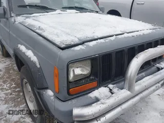 1999 Jeep Cherokee Sport with VIN 1J4FT68S1XL511195, listed as a IAAI auction lot 41651025 with Not provided miles and . Bid and sale history available at DreamBid. Image 6.