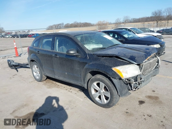 2010 Dodge Caliber SXT with VIN 1B3CB4HA4AD651946, listed as a IAAI auction lot 41771139 with 165,663 mi miles and . Bid and sale history available at DreamBid. Image 1.
