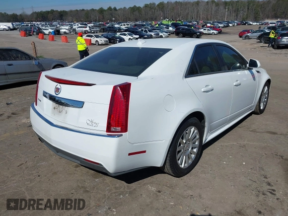 2011 Cadillac CTS Luxury with VIN 1G6DE5EY5B0119957, listed as a IAAI auction lot 41642172 with 228,401 mi miles and . Bid and sale history available at DreamBid. Image 4.