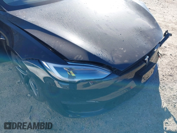 2021 Tesla Model S Long Range z VIN 5YJSA1E50MF438864, wystawiony jako IAAI lot #41190778 z przebiegiem Nie podano mil oraz . Historia ofert i sprzedaży dostępna na DreamBid. Obrazek 20.