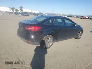 2018 Ford Focus SE with VIN 1FADP3F21JL288026, listed as a Copart auction lot 46908205 with 70,739 mi miles and Salvage Title. Bid and sale history available at carsss.com. Image 3.
