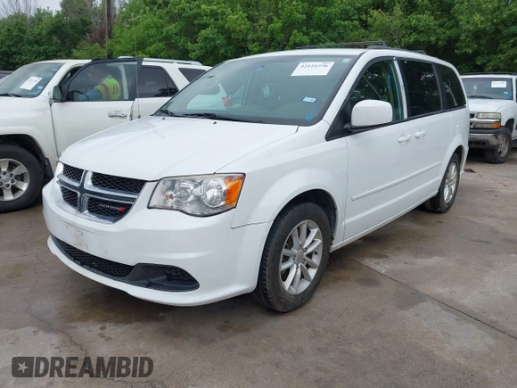 2015 Dodge Grand Caravan SXT with VIN 2C4RDGCG2FR548433, listed as a IAAI auction lot 42121256 with 161,459 mi miles and . Bid and sale history available at DreamBid. Image 2.