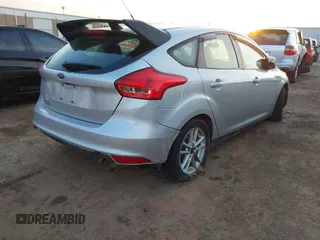 2015 Ford Focus SE with VIN 1FADP3K22FL282457, listed as a IAAI auction lot 41872989 with 98,590 mi miles. Bid and sale history available at carsss.com. Image 4.
