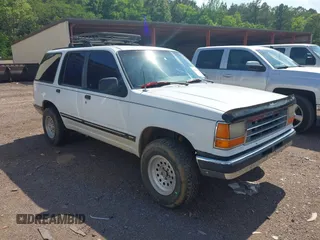 1991 Ford Explorer Eddie Bauer z VIN 1FMDU34X6MUC65143, wystawiony jako IAAI lot #42132106 z przebiegiem 7 618 mil mil oraz . Historia ofert i sprzedaży dostępna na DreamBid. Obrazek 1.