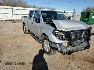 2008 Nissan Frontier SE z VIN 1N6AD07U98C441926, wystawiony jako Copart lot #84205144 z przebiegiem Nie podano mil oraz Szkoda całkowita • Salvage title. Historia ofert i sprzedaży dostępna na DreamBid. Obrazek 11.