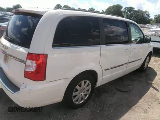 2013 Chrysler Town & Country Touring with VIN 2C4RC1BG1DR721230, listed as a IAAI auction lot 42220816 with 131,645 mi miles and . Bid and sale history available at DreamBid. Image 4.