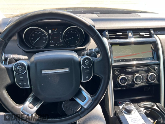 2017 Land Rover Discovery HSE with VIN SALRRBBV7HA016051, listed as a Copart auction lot 56985535 with 138,244 mi miles and Clean Title. Bid and sale history available at DreamBid. Image 7.