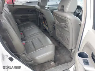 2006 Honda Pilot EX-L with VIN 2HKYF18576H517590, listed as a IAAI auction lot 41802601 with 233,833 mi miles. Bid and sale history available at carsss.com. Image 8.