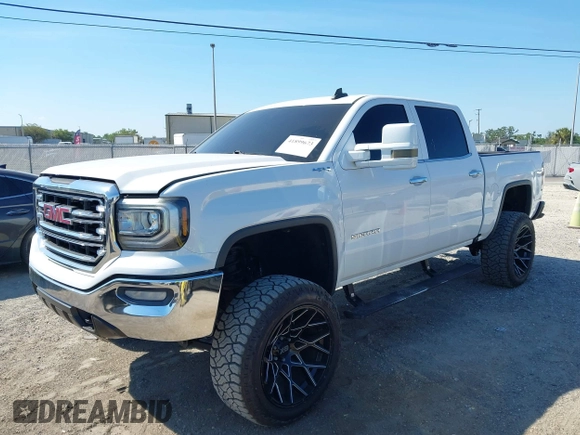 2017 GMC Sierra 1500 SLT z VIN 3GTU2NEC2HG474079, wystawiony jako IAAI lot #41899673 z przebiegiem 104 033 mil mil oraz . Historia ofert i sprzedaży dostępna na DreamBid. Obrazek 17.