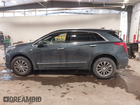 2019 Cadillac XT5 Luxury AWD z VIN 1GYKNDRS0KZ213092, wystawiony jako IAAI lot #41510497 z przebiegiem 26 030 mil mil oraz . Historia ofert i sprzedaży dostępna na DreamBid. Obrazek 14.