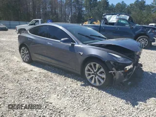 2020 Tesla Model 3 Long Range with VIN 5YJ3E1EBXLF807033, listed as a Copart auction lot 49548665 with 32,031 mi miles and Salvage Title. Bid and sale history available at carsss.com. Image 4.