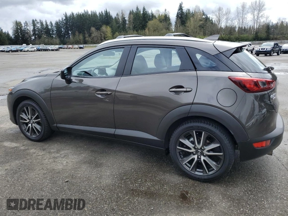 2017 Mazda CX-3 Touring with VIN JM1DKFC79H0148103, listed as a Copart auction lot 51343025 with 79,765 mi miles and Salvage Title. Bid and sale history available at DreamBid. Image 2.