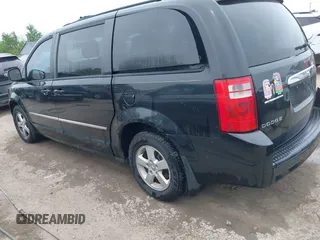 2010 Dodge Grand Caravan SXT z VIN 2D4RN5D12AR444953, wystawiony jako IAAI lot #42247277 z przebiegiem 214 387 mil mil oraz . Historia ofert i sprzedaży dostępna na DreamBid. Obrazek 14.