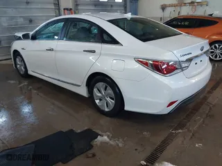 2014 Hyundai Sonata Hybrid with VIN KMHEC4A42EA117405, listed as a IAAI auction lot 41157185 with 74,225 mi miles. Bid and sale history available at carsss.com. Image 3.