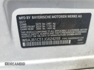 2018 BMW 5 Series 530e xDrive with VIN WBAJB1C51JG624259, listed as a Copart auction lot 57161285 with 133,463 mi miles and Clean title. Bid and sale history available at DreamBid. Image 12.